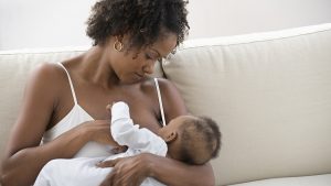 Mother breastfeeding baby