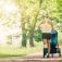 Running woman with baby stroller
