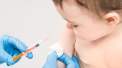 Young child getting vaccination