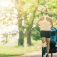 Running woman with baby stroller