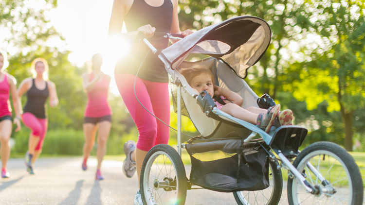 Mum pushing her pushchair