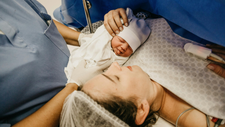 Image of Mother and baby following caesarean